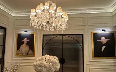 Grand multi-tiered crystal chandelier in an elegant room